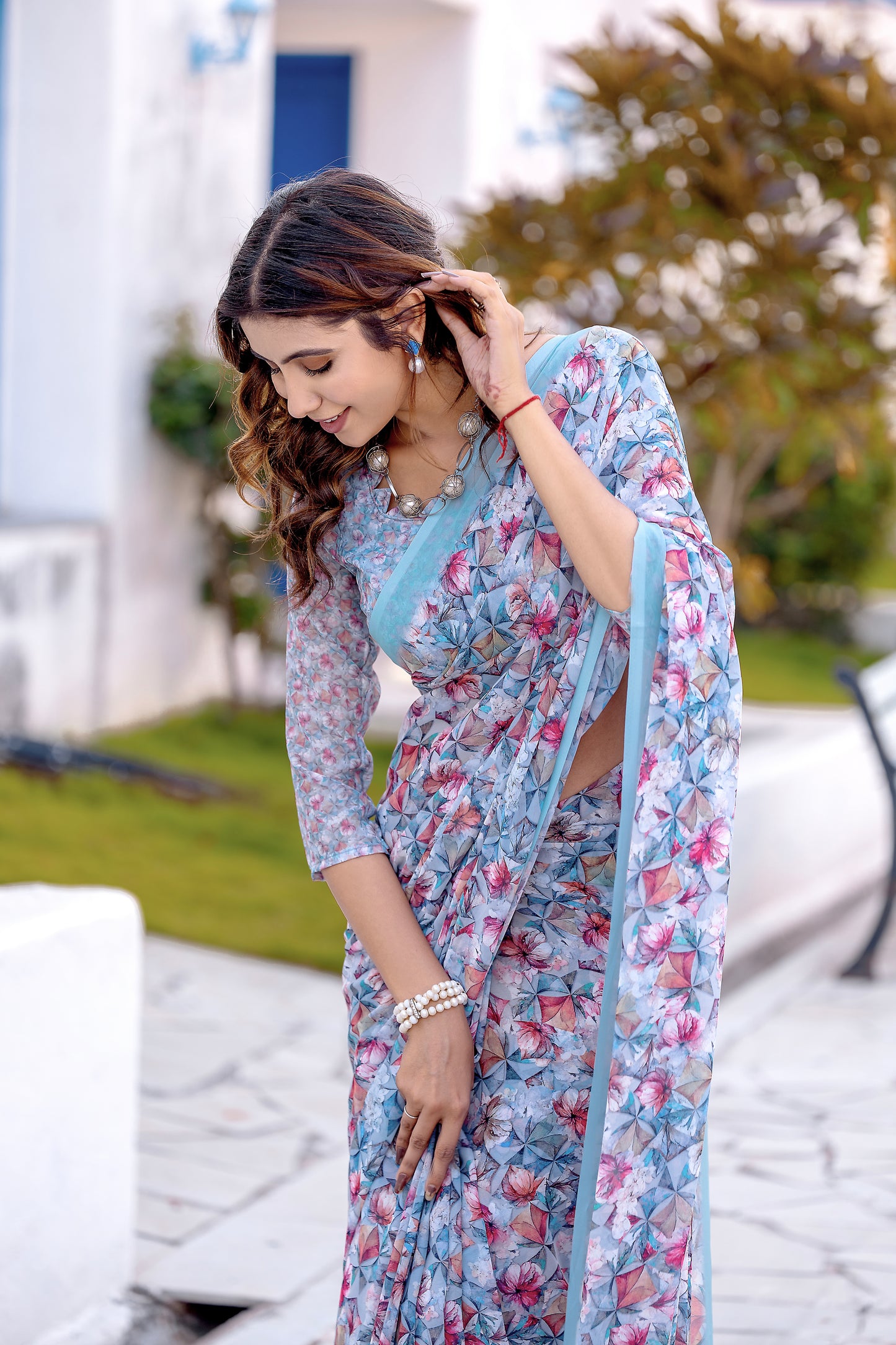 Luxurious Weightless Alice Blue Saree with Multicolored Design