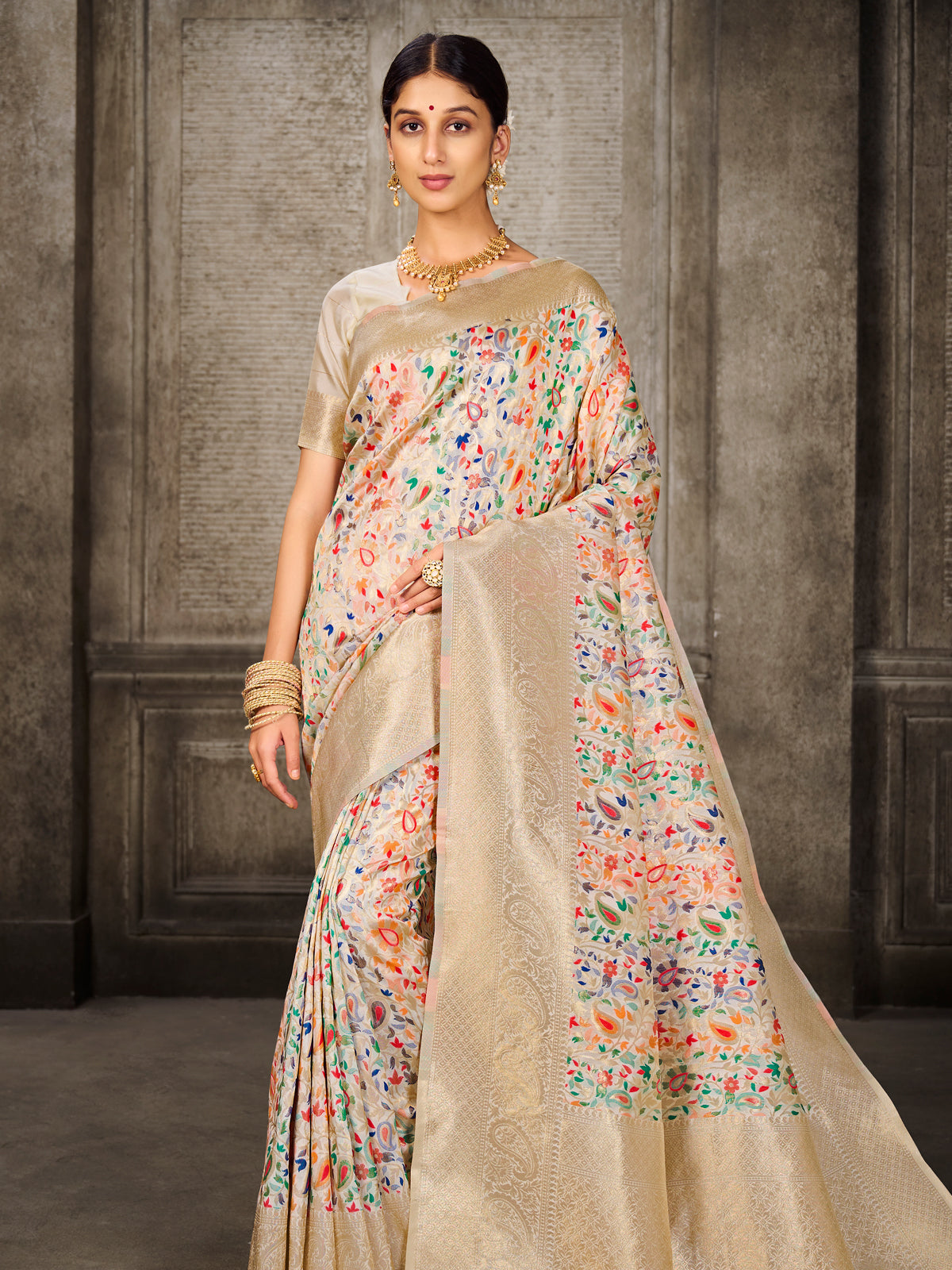 Kanjivaram Silk White Saree with Antique Gold Minakari Kani Work