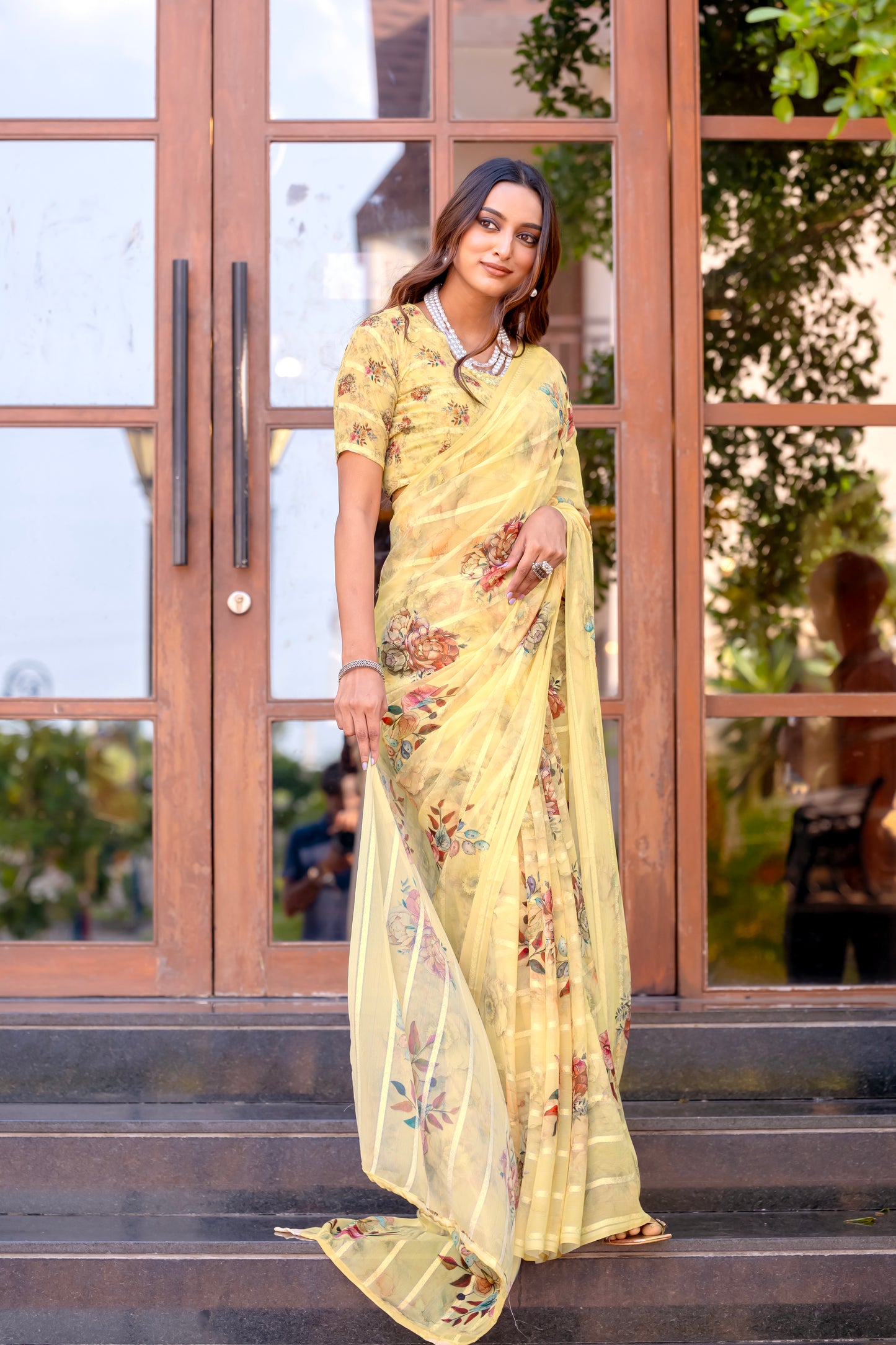 Elegant Weightless Saree Featuring Multi Colored Patterns