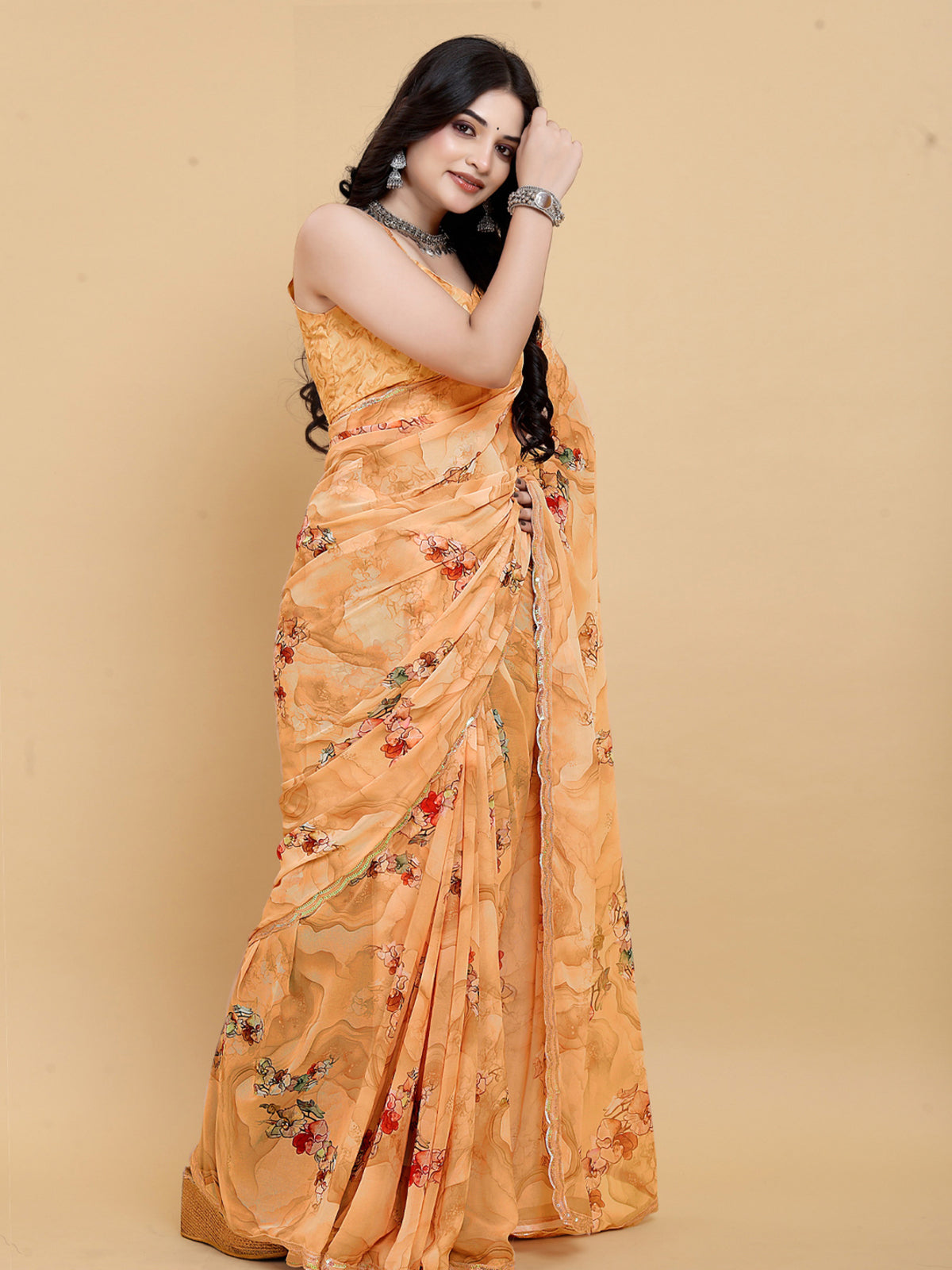 Weightless Orange Saree with Multicolored Designs