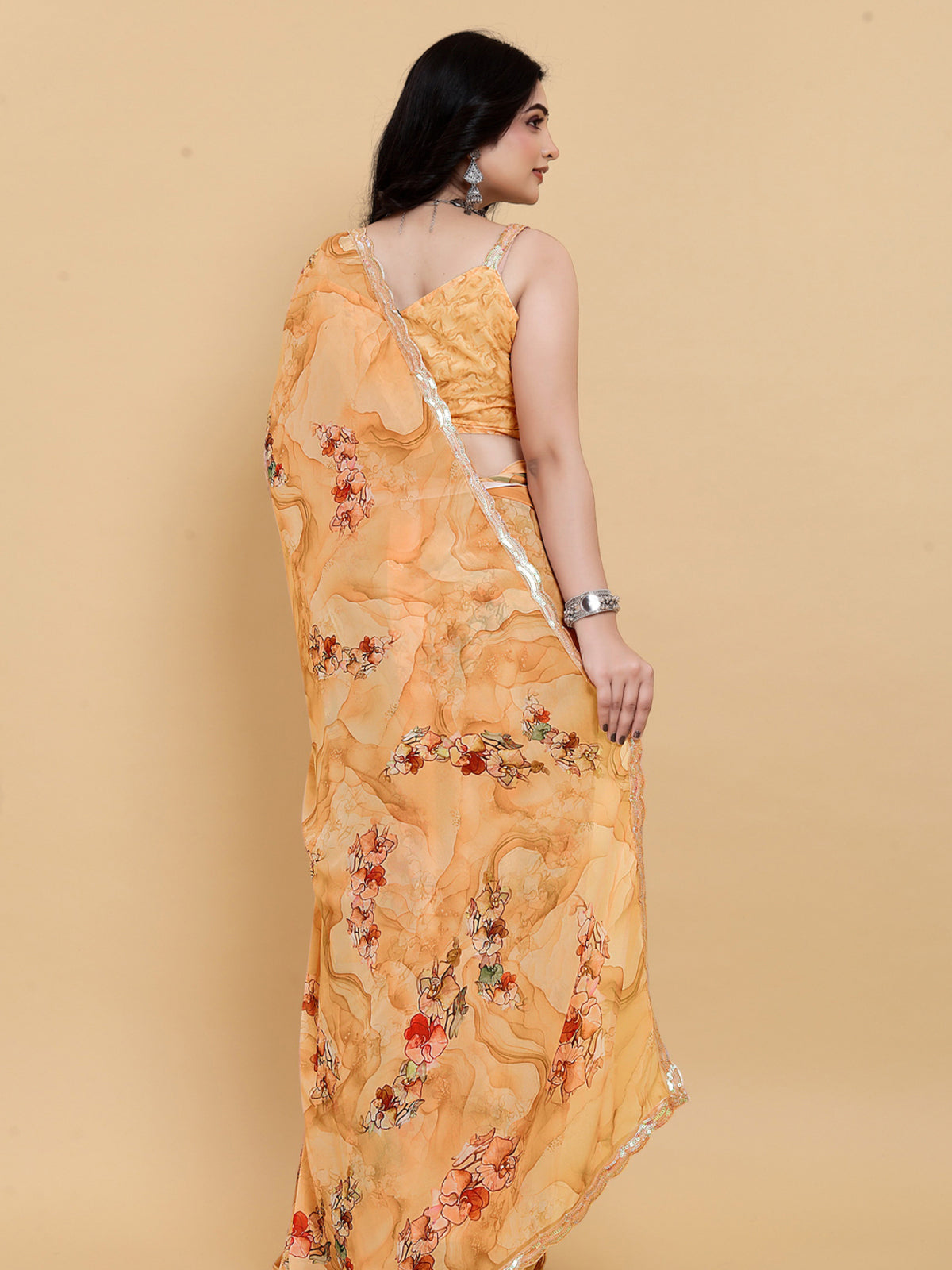 Weightless Orange Saree with Multicolored Designs