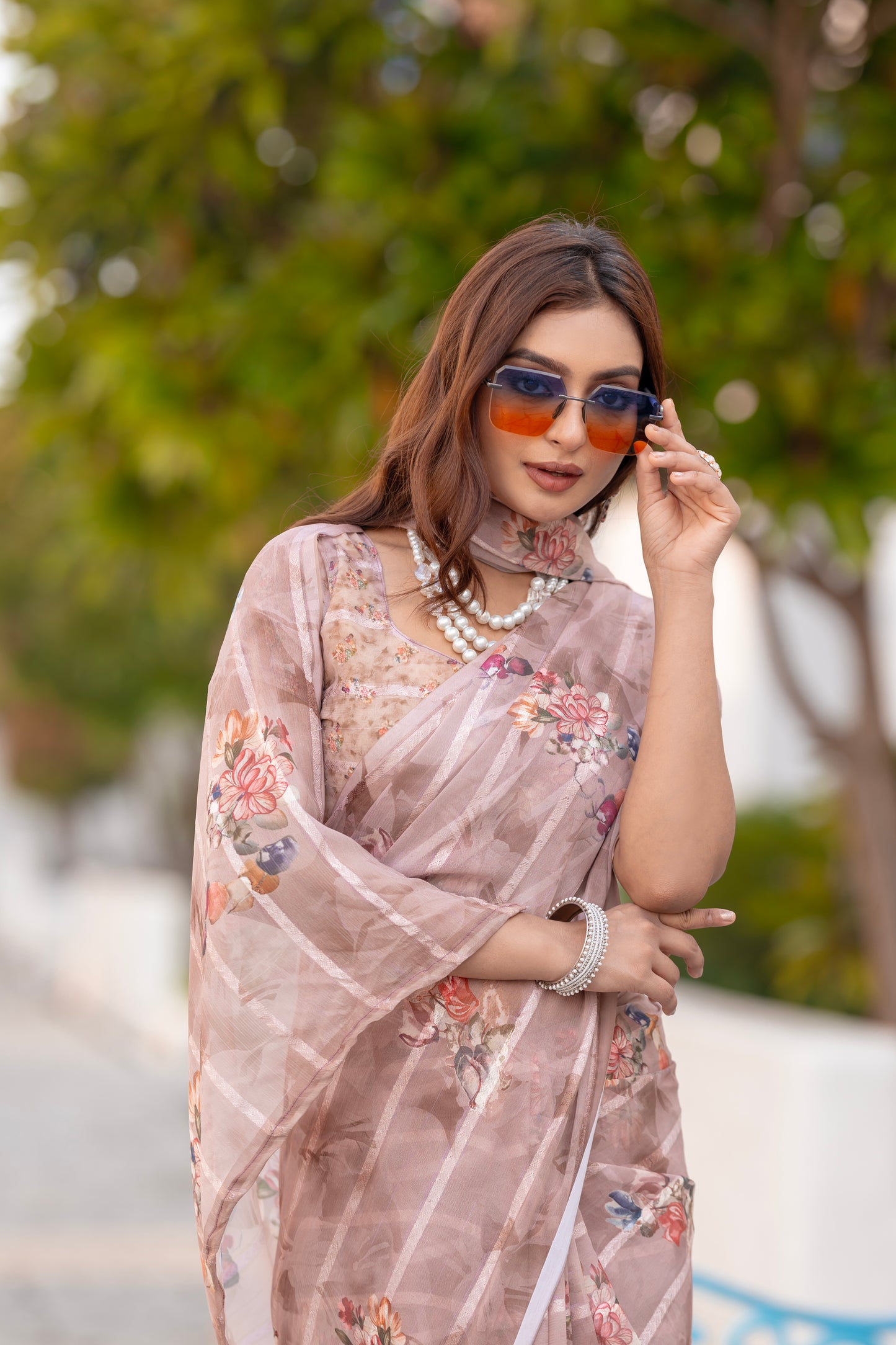 Elegant Weightless Saree Featuring Multi Colored Patterns