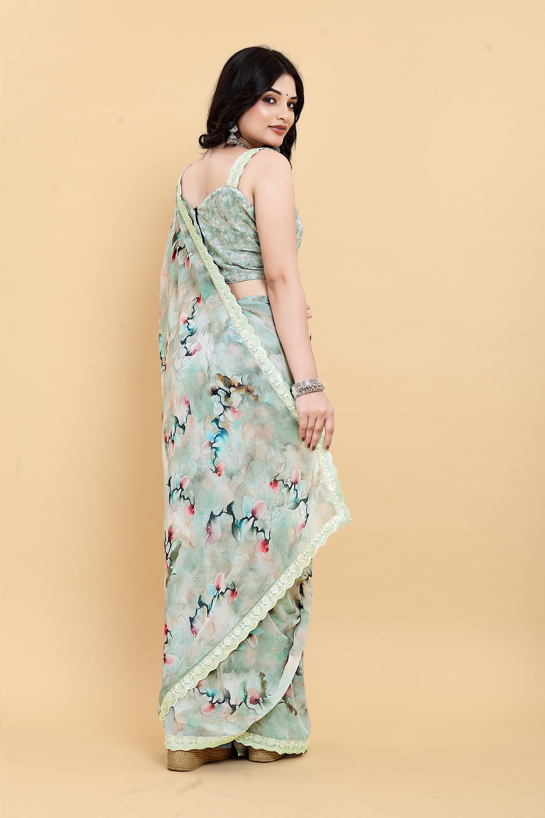 Weightless Green Saree with Multicolored Designs
