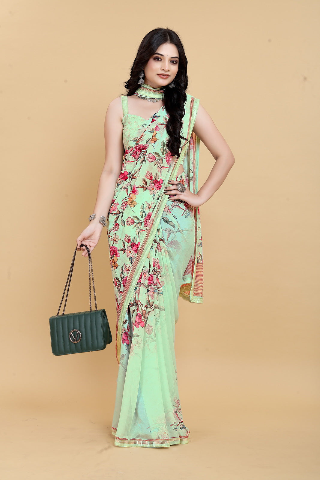 Luxurious Weightless Pista Saree with Multicolored Design