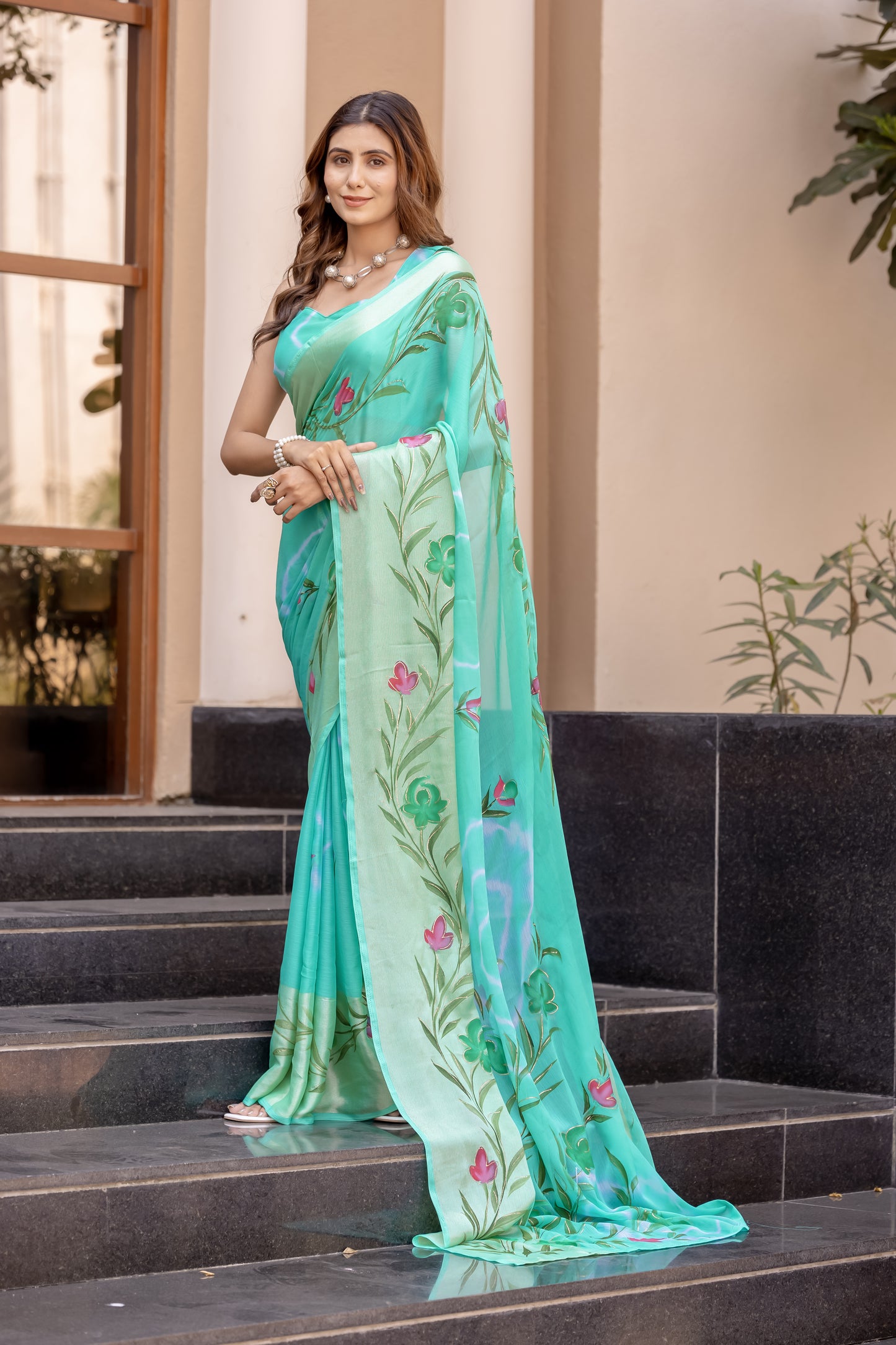 Chiffon Rama Green Saree Featuring Delicate Hand Painted Floral Motifs