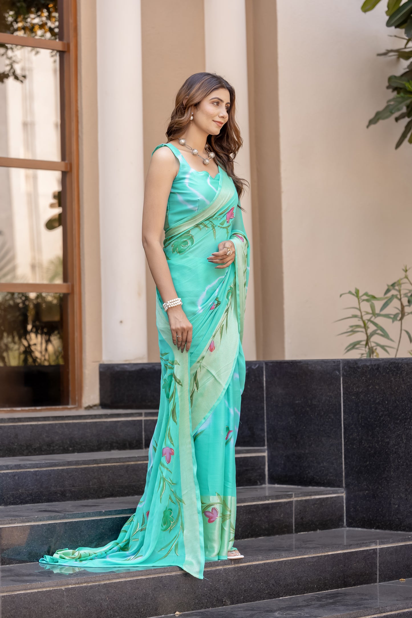 Chiffon Rama Green Saree Featuring Delicate Hand Painted Floral Motifs