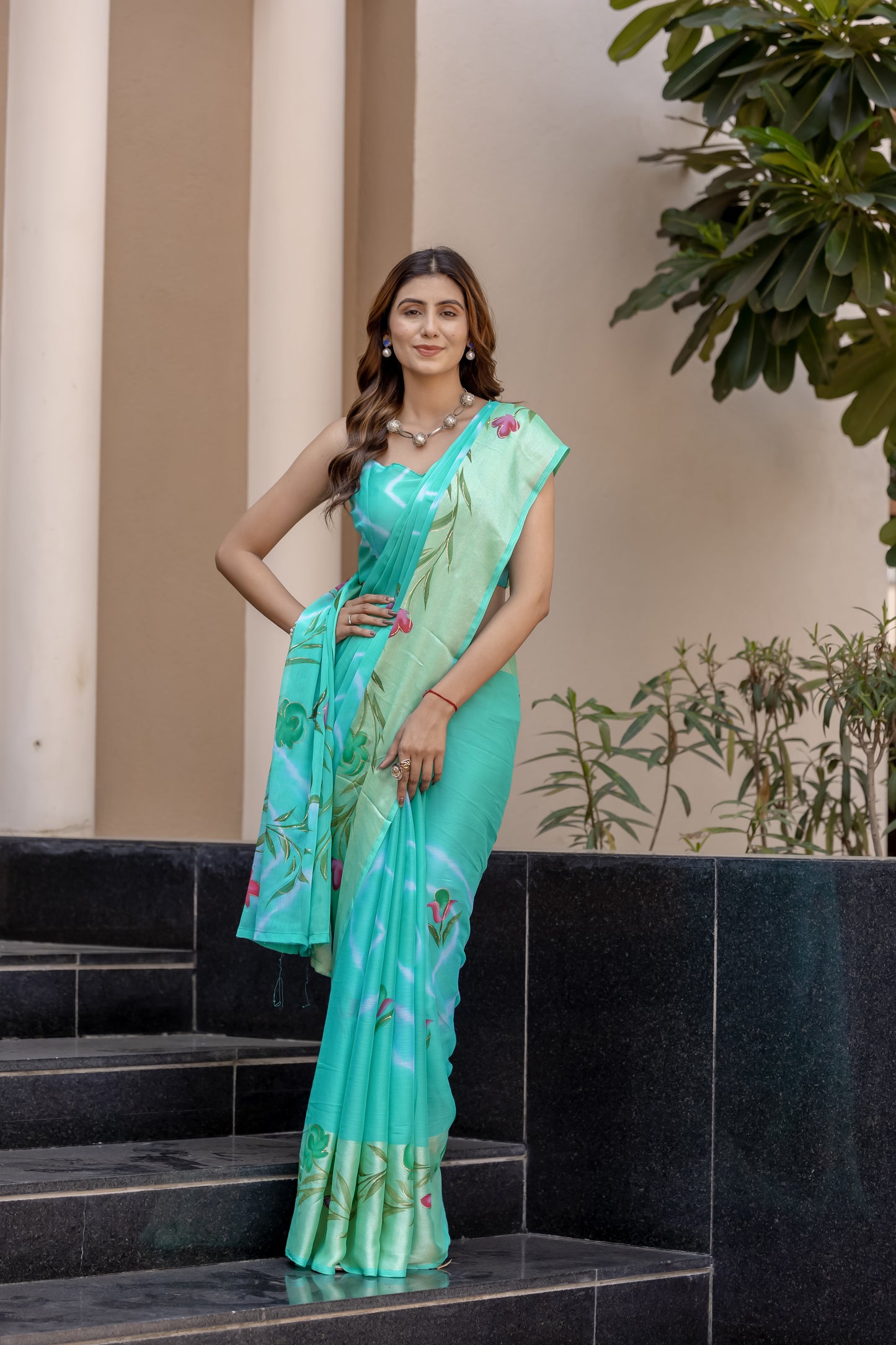 Chiffon Rama Green Saree Featuring Delicate Hand Painted Floral Motifs