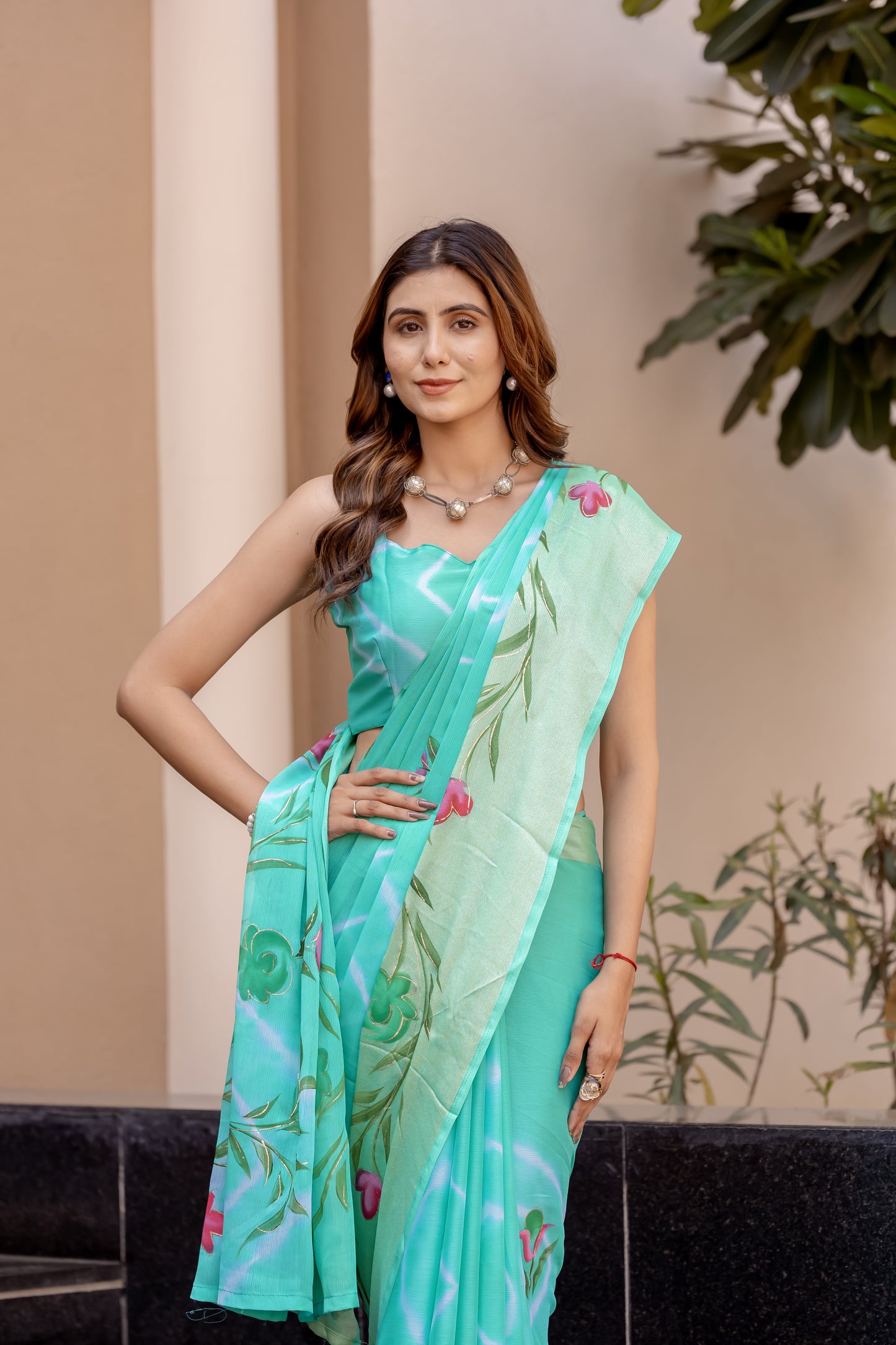 Chiffon Rama Green Saree Featuring Delicate Hand Painted Floral Motifs