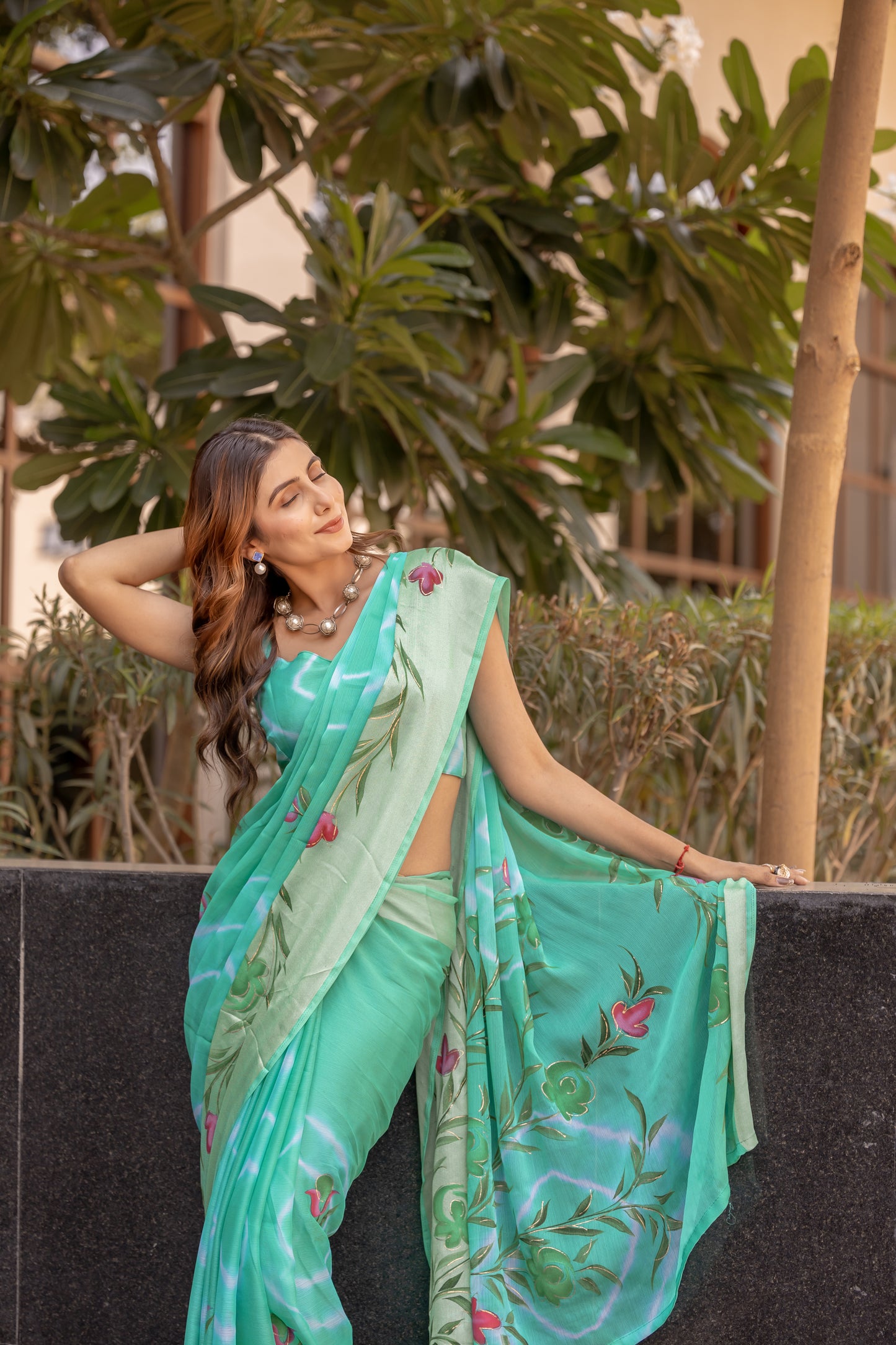 Chiffon Rama Green Saree Featuring Delicate Hand Painted Floral Motifs