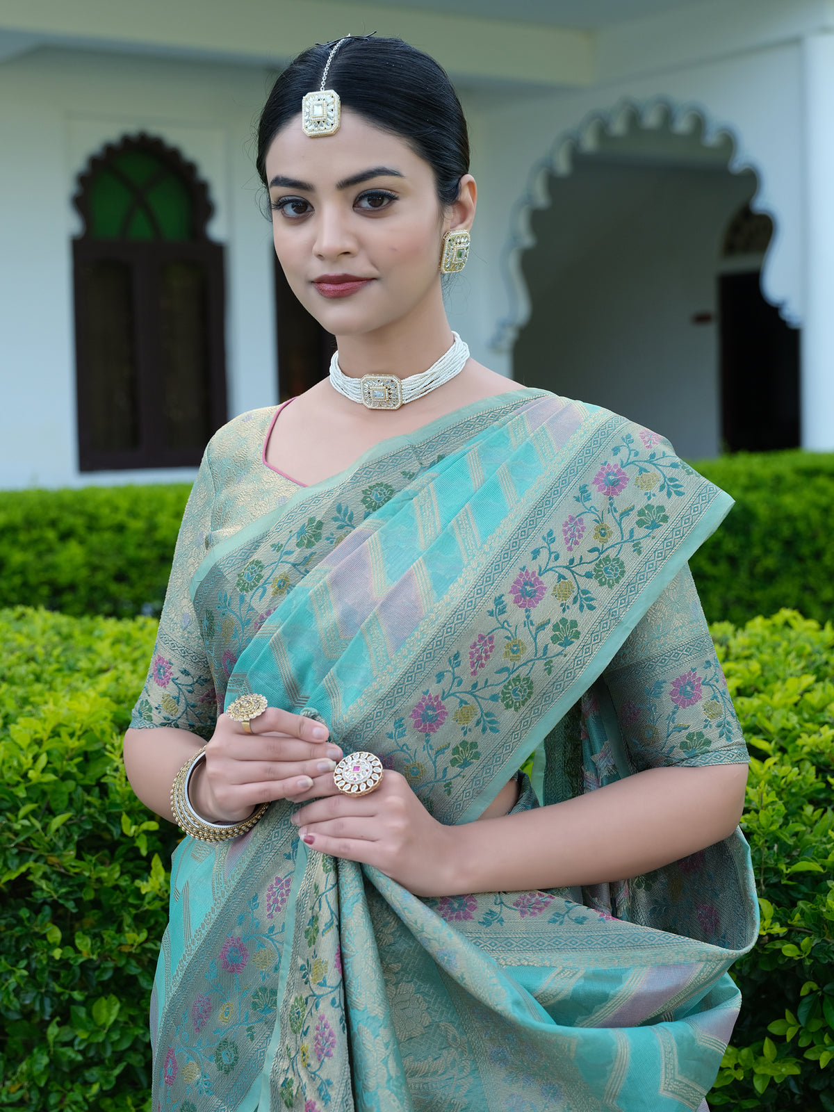 Orange Organza Saree with Multicolored Zari Embroidery