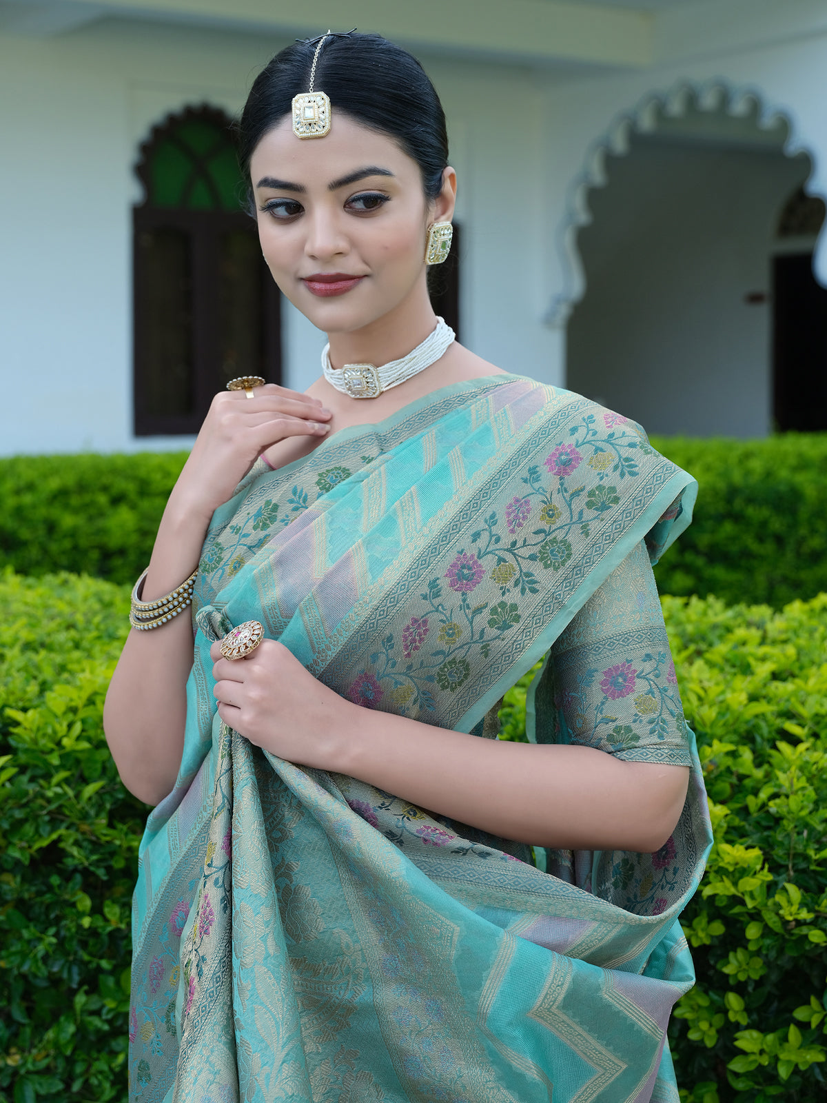 Orange Organza Saree with Multicolored Zari Embroidery