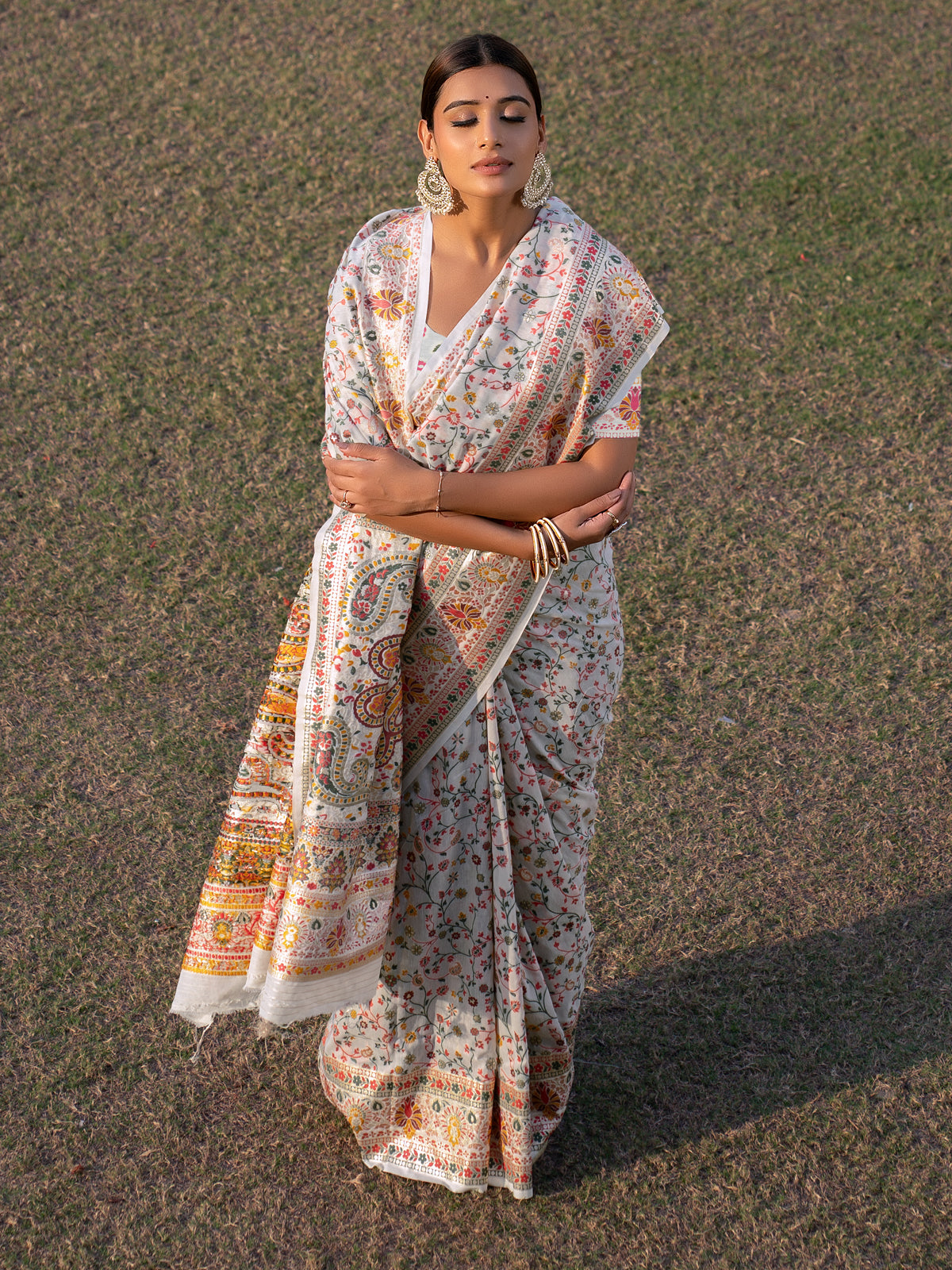 Pure White Blended Jamdani Silk Saree with Antique Gold and Multicolored Minakari Kani Work