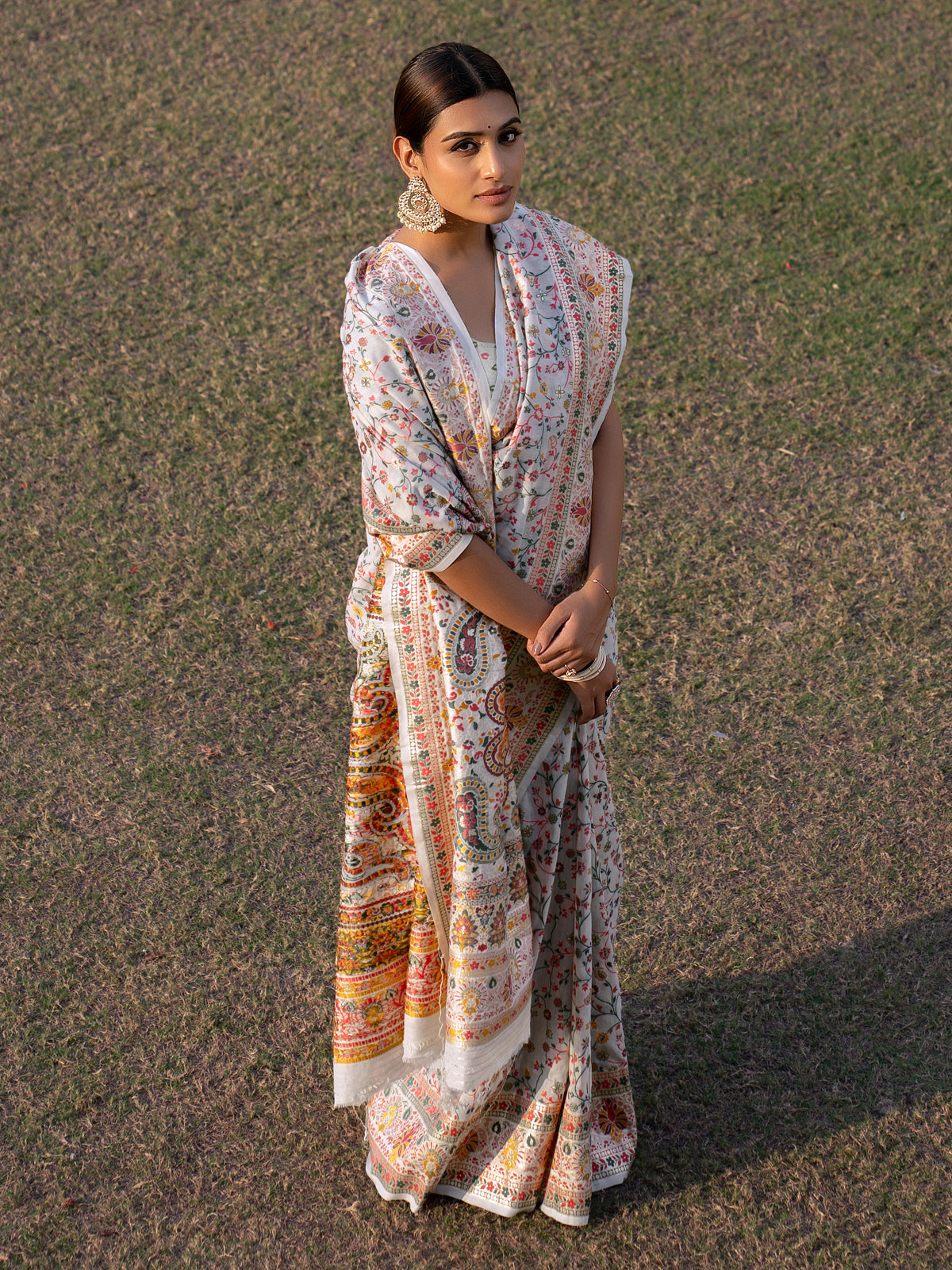 Pure White Blended Jamdani Silk Saree with Antique Gold and Multicolored Minakari Kani Work